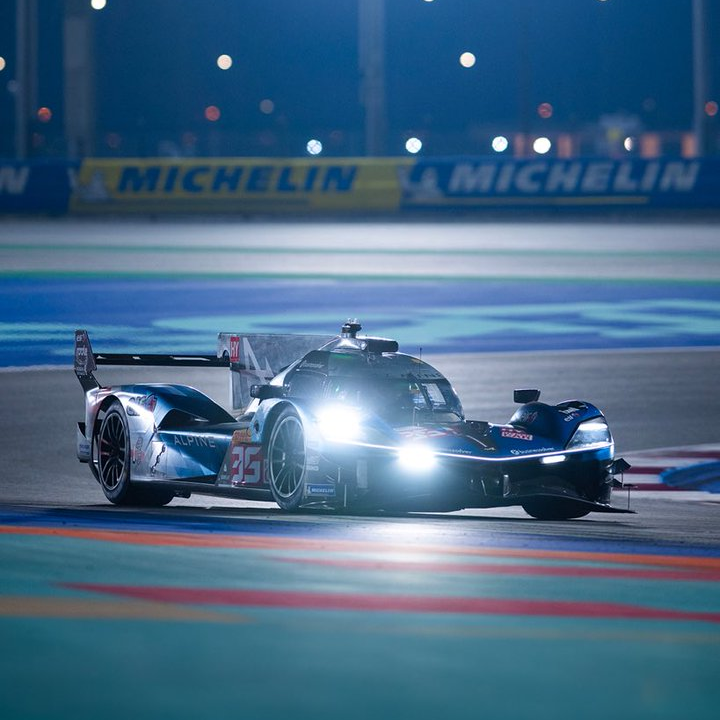 The Alpine A424 running under lights at Qatar; posted by Signatech Alpine on X.