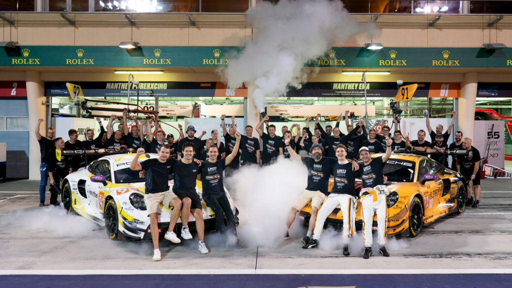 The winning Pure Rxcing and second-place EMA squads with their 911 GT3 Rs and the Manthey team, photographed at Bahrain and posted to X/Twitter by Porsche.