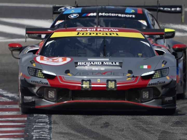 The #54 Ferrari 296 leads one of the BMW GT3 cars in practice at Bahrain (photo taken by AF Corse and posted to X/Twitter).